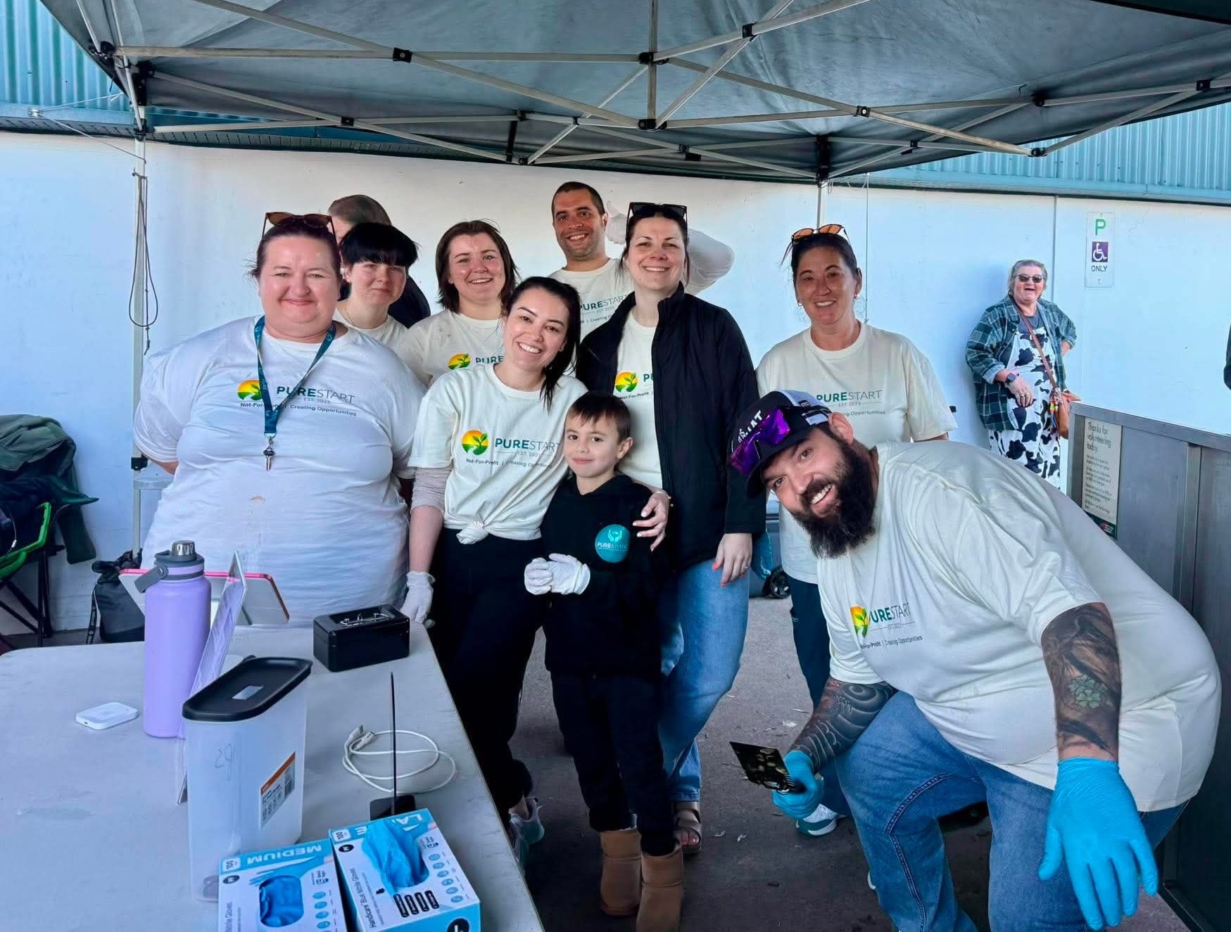 Pure Start team working the Bunnings sausage sizzle