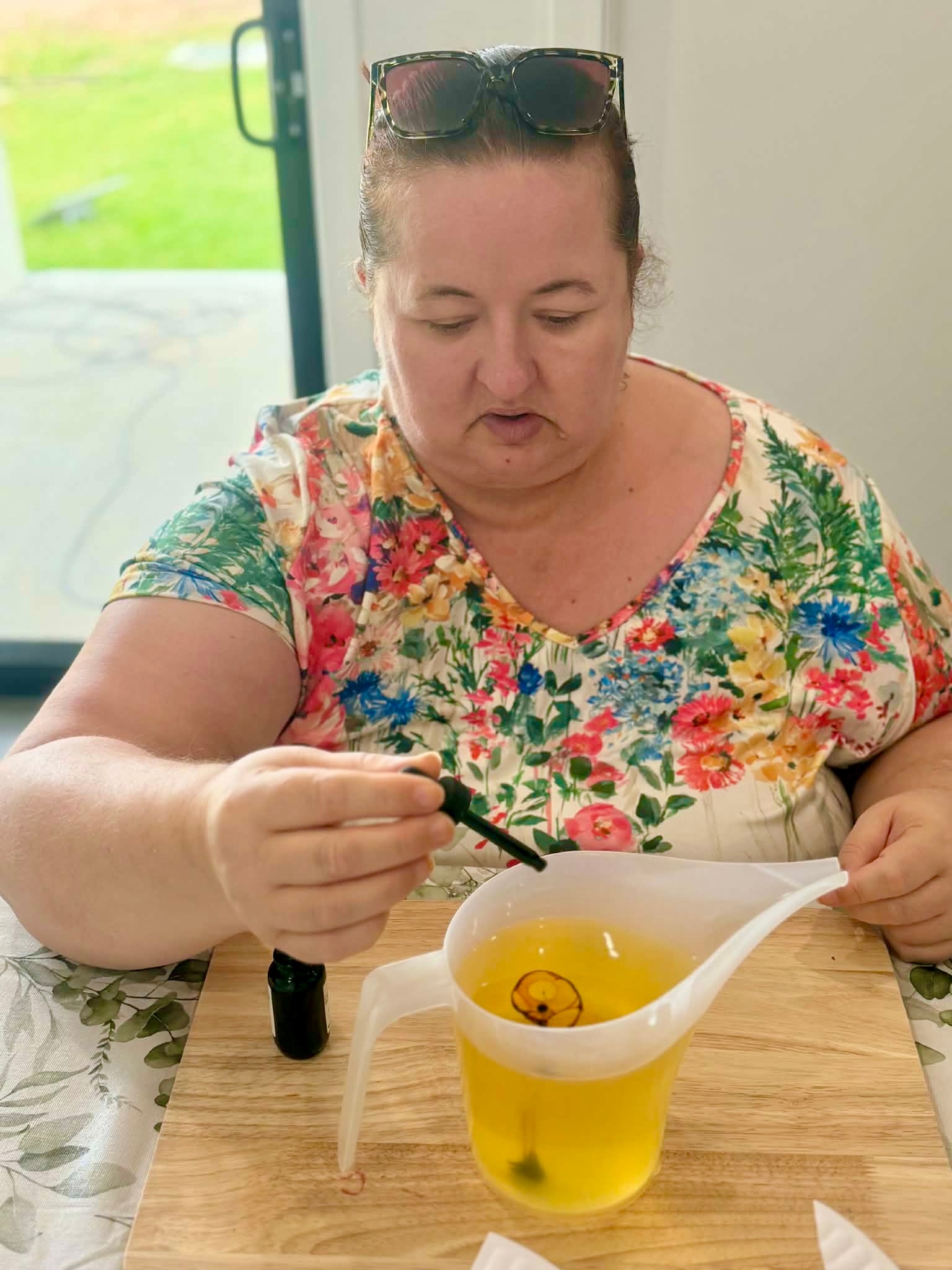 Participant making candles at the Skills Hub